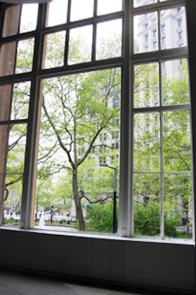 The windows of the space overlook Battery Park.