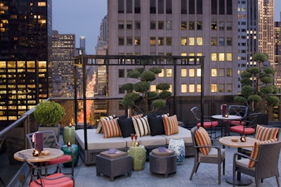 Chinese-style daybeds fill the outdoor terraces of Salon de Ning. Photo: Courtesy of the Peninsula Hotel Group