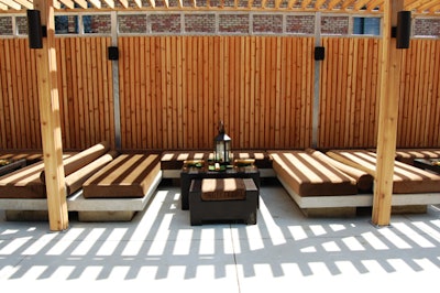 The 3,000-square-foot patio features a series of cabanas with plush seating.