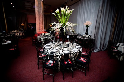 The Kennedy Center gala's preperformance dinner went for a black and white color scheme, with all-white centerpieces in black vases.
