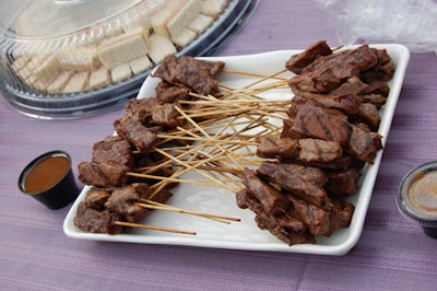 Tables of finger foods like beef skewers and sandwiches accompanied the wine tasting.