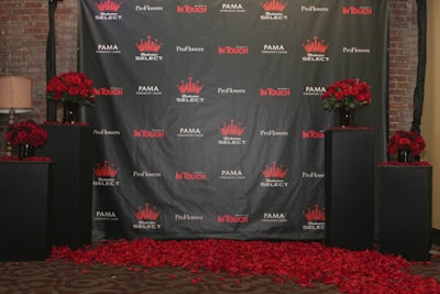 Party sponsor ProFlowers covered the step-and-repeat at the In Touch party with rose petals.