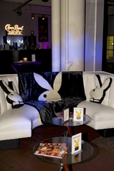 Furry Playboy bunny pillows and blankets accented the white leather couches, and a Crown Royal Cask No. 16 bar served up cocktails in the V.I.P. area.