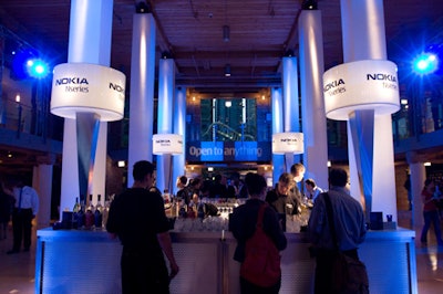 Oversize lampshades adorned with the Nokia logo anchored the bar.