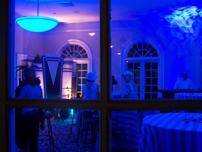 Sight & Sound Productions drenched the inside of the speakeasy with cool blue lighting.