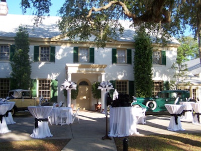 Antique cars and cocktail tables were set up outside the Ribault Club in Jacksonville.