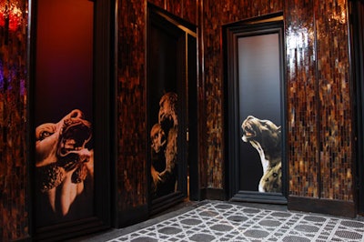 The doors to the stalls in the unisex bathroom can be customized with logos for private events.