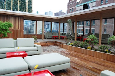 The upper-level deck of Hudson Terrace has a large fireplace, bathrooms, a bar, and a separate DJ booth.