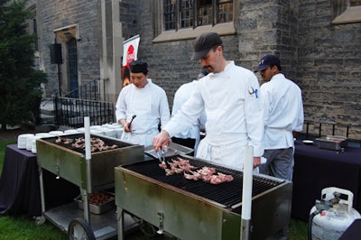 Chefs prepared a dish of barbecue lamb chops created by Anthony Sedlak, host of the Food Network program The Main, at Santé Down Under.