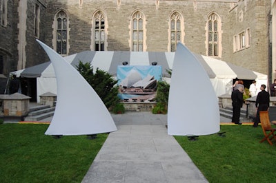 A backdrop featuring the Sydney Opera House and two sculptural spandex pieces, courtesy of Eventscape, sat at the end of a path leading through the courtyard at Hart House.