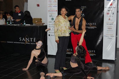 Dancers from Aerial Angels posed with guests during the California Cruisin' event at the Royal Ontario Museum.