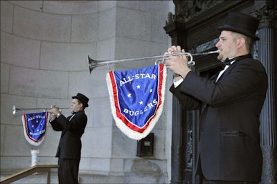 Professional race-track bugle-blowers the All-Star Buglers serenaded guests entering the event.