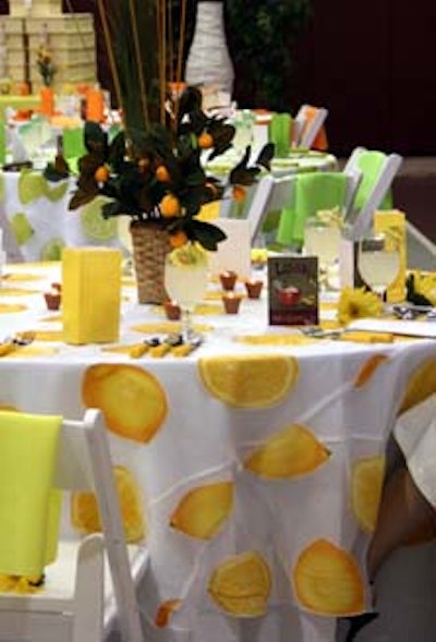 Anything is Posh-Able transformed a typical gymnasium into a sunny citrus grove with an abundance of lime green, lemon yellow, and sunset orange decor elements.