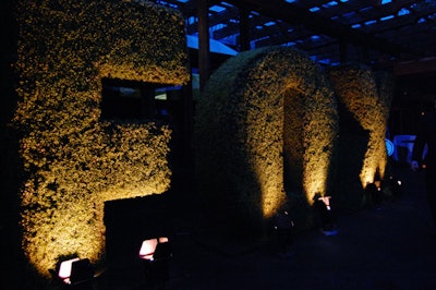 A large topiary spelling the network's name ushered guests into the tent erected on Wollman Rink.