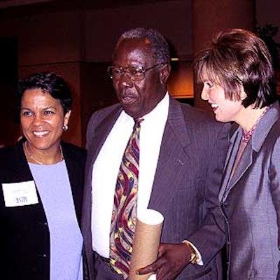 Kathleen Francis, vice president of marketing at Major League Baseball; baseball Hall of Famer Hank Aaron; and CBS sportscaster Lesley Visser at the Women in Sports and Events Women of the Year awards at the Marriott Marquis.