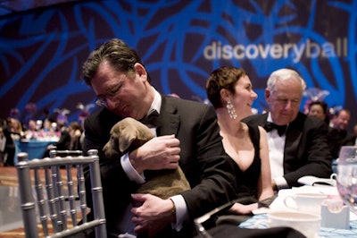 Charlie Trotter placed a winning bid of $25,000 on an eight-week-old silver Labrador retriever.