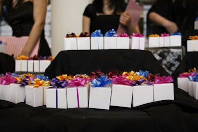 At the silent auction, guests could buy 'mystery boxes.' If the number on the bottom of the box matched the number inside the box, the bidder won a trip to Arizona.