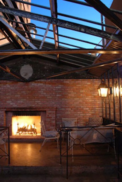 The greenhouse includes a smoking patio and a gaslit fireplace.