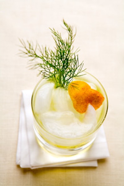 The Harvey, with vodka, Galliano, tangerine syrup, and soda water, garnished with a fennel stalk and orange peel, from Fig Catering.