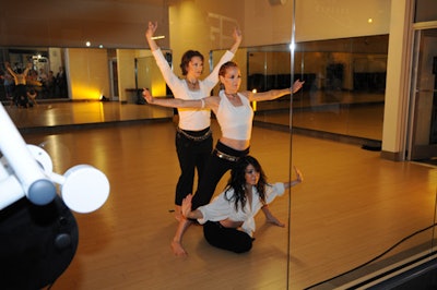 Equinox yoga instructors used the cardio studio as a performance space during the event.