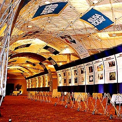 During the pre-awards cocktail hour, a steel pipe tunnel displayed all of the Effie finalists with information and pictures about their work. USA Today was one of the major corporate sponsors of the awards program. (Photo by Doug Goodman)