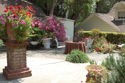 The home's back yard offered alfresco seating.