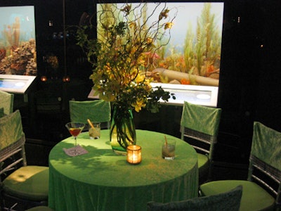 In 2003, guests sipped cocktails at tables draped in velvety lime-green tablecloths, just feet from displays of prehistoric sea life.