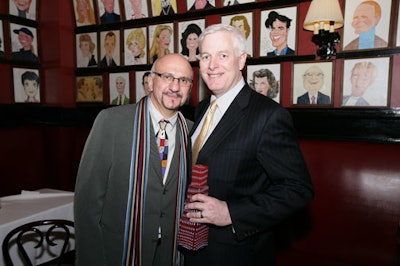 Anthony Napoli (left) awards John Sweeney of the Westin Times Square with the June Briggs award.