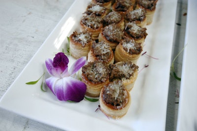 Passed hors d'oeuvres included tandoori beef rolls with coconut and tamarind.