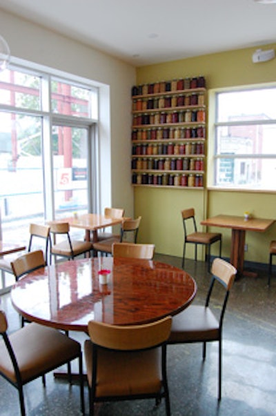 Polished concrete floors and cherrywood tables decorate the 736-square-foot space.