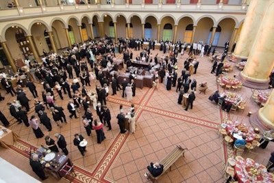 The predinner reception area offered tastings from eight local chefs and old-fashioned wood-and-iron benches as seating.