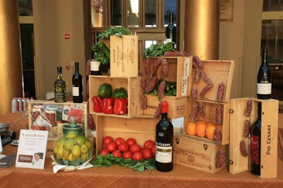 The display at the Il Mulino booth included open crates of wines and fresh vegetables.