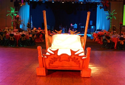 A bed outfitted with a mini trampoline, for entertainment purposes, was placed in the middle of the dance floor to create the feeling of being inside Max's bedroom.