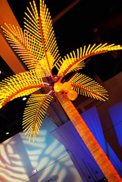 Twelve towering neon palm trees assisted in transforming the space into a jungle atmosphere.