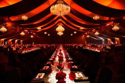 Bounce hung a mix of small and large chandeliers from the tent's ceiling to create a high-end look.