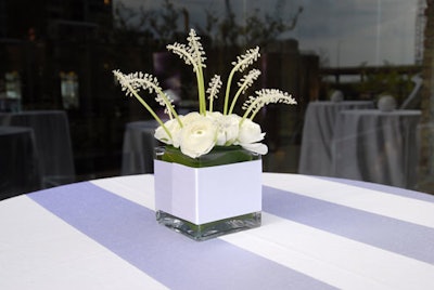 Ivan Carlson & Associates provided floral arrangements for tabletops located throughout the venue.