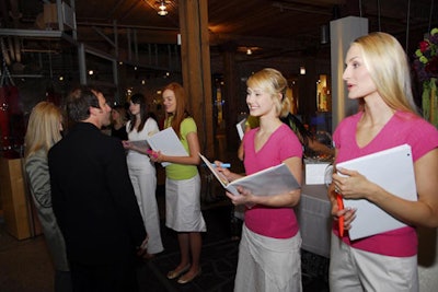 Models in color-coordinated tops reflected the event invitation design.