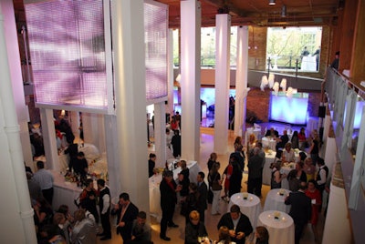 A four-sided suspended wall of LCD panels was attached to a steel truss and displayed colorful images and sponsor logos.