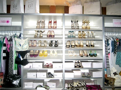 Innerspace Custom Storage and Intermix boutique recreated Carrie's much-beloved closet complete with a wall of designer shoes courtesy of Jimmy Choo.