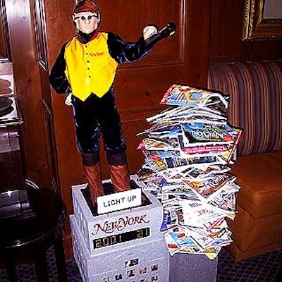 New York magazine's velvet and yellow vest-clad statue stood atop the New York magazine building, with pictures of celebs by Patrick McMullan peering through the windows. A three-year supply of back issues was stacked next to the statue.