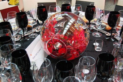 San Remo Florist filled glass spheres with red roses and silver balls as an alternate centrepiece.