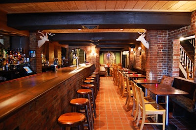 The downstairs 70-seat Cantina retains the original pub decor, with added modern touches such as bright white deer-head mounts and eight flat-screen TVs.