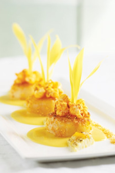 3. PopcornThis popular nibble is appearing on menus as breading, pureed in soup, and infused with truffles as a high-end bar snack.Entrée: Popcorn-encrusted diver scallops with yellow corn sauce and fresh corn shoots, from Windows Catering Company in Washington, D.C.