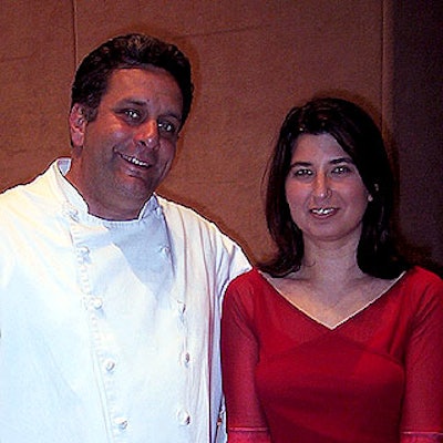Chef Thomas Preti and event manager Lori Slater of Thomas Preti Caterers posed at Cancer Care's Summer Soiree auction benefit at Sotheby's.