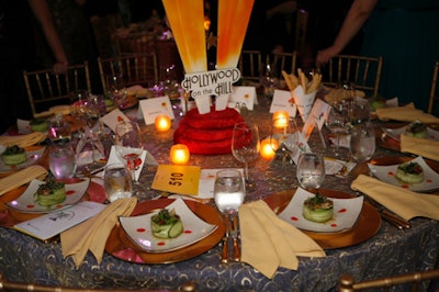 The custom-made centerpieces reflected the evening's 'Hollywood on the Hill' theme.