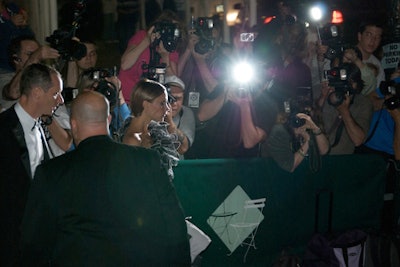 Guests like Victoria Beckham endured a long line of paparazzi on their way to and from the Bryant Park Grill.