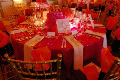 The tables took a unique approach, with programs placed upright at every other place setting and folded napkins hanging over the edges.