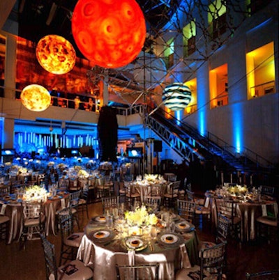 Faux planets hung from the ceilings to complement the Star Wars theme at the Discovery Ball.