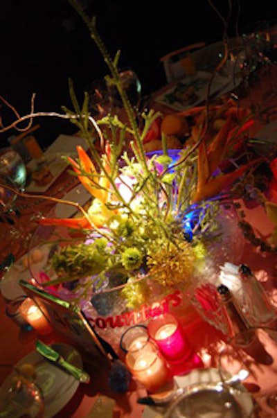 For the dinner tables, Vince Hart of Kehoe Designs created pondlike centerpieces that overflowed with faux coral and crystal rocks.