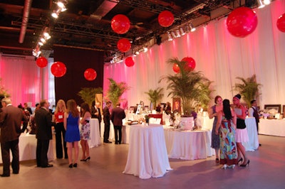 Red balloons hung from the ceiling in the Artifacts Room where the Silent Auction Company staged a silent auction.